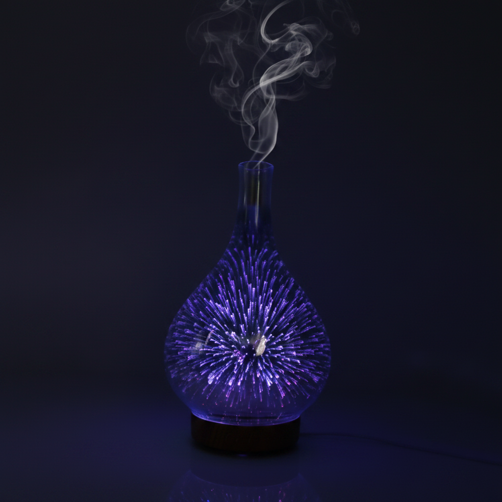 Fireworks Glass Aroma Diffuser with 3D blue purple galaxy effect and mist in dark moody setting