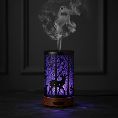 Dark Forest Deer Aroma Diffuser with iron art silhouette glowing blue-purple in moody dark setting